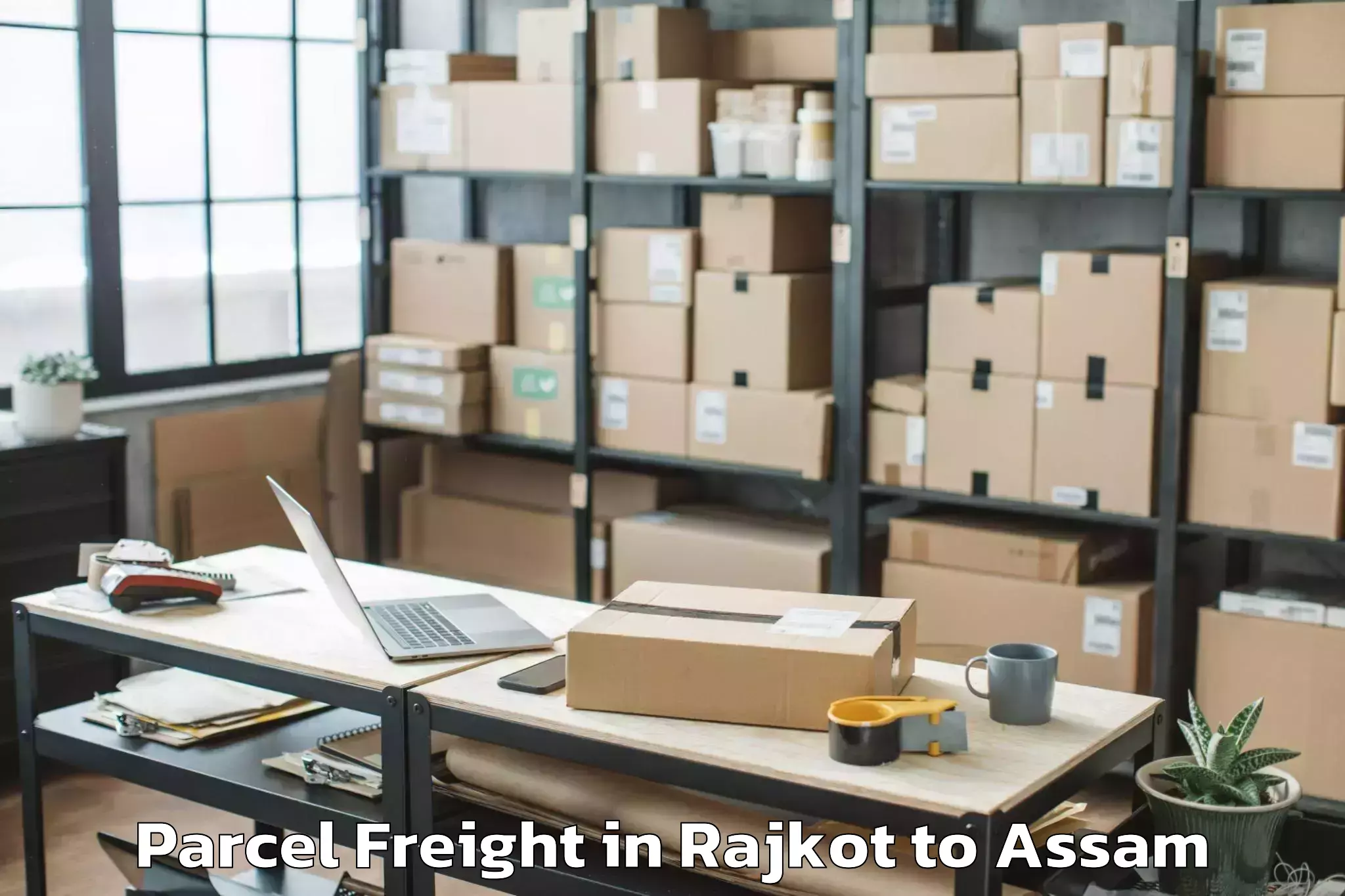 Book Rajkot to Biswanath Chariali Parcel Freight Online